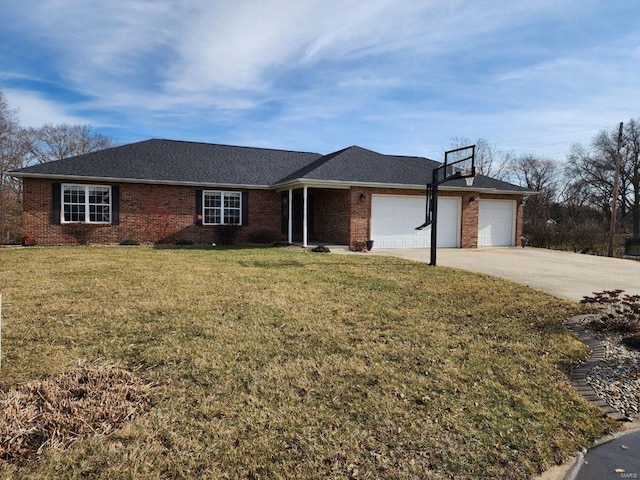 ranch-style home featuring a garage and a front yard