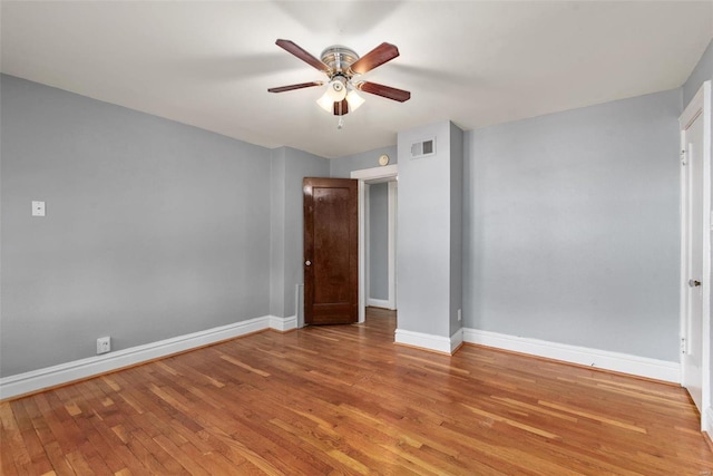 unfurnished bedroom featuring ceiling fan and light wood-type flooring