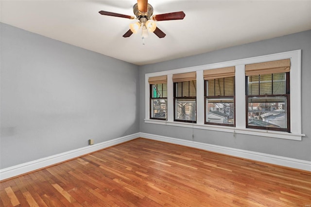 unfurnished room featuring ceiling fan and light hardwood / wood-style flooring