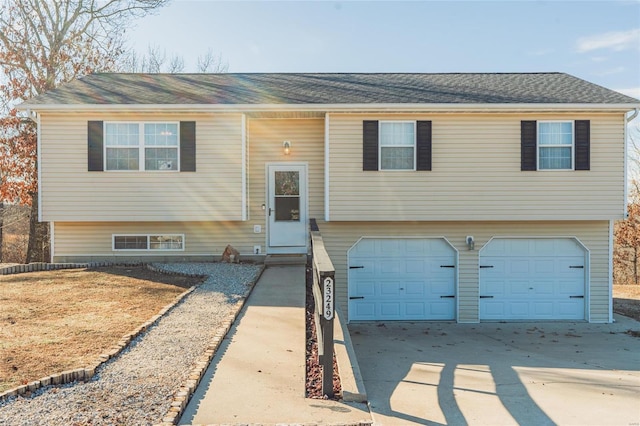 split foyer home featuring a garage