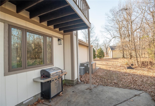 view of patio / terrace with a grill and central AC