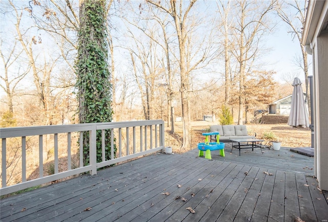 wooden deck featuring an outdoor living space