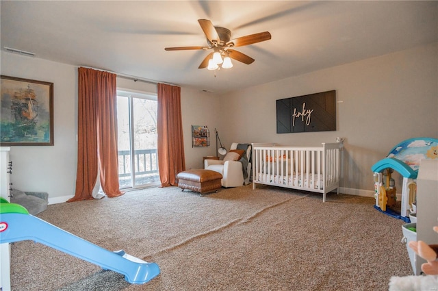 carpeted bedroom featuring access to exterior and ceiling fan