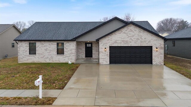 view of front of home with a garage