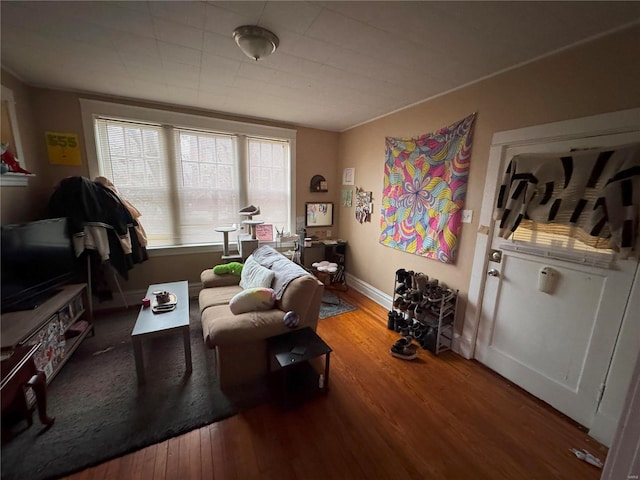 living room with wood finished floors and baseboards