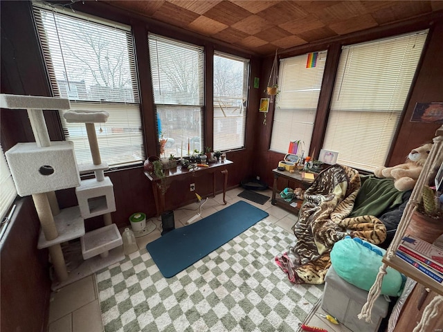 sunroom / solarium featuring wooden ceiling