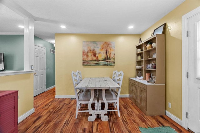 dining room featuring dark hardwood / wood-style floors