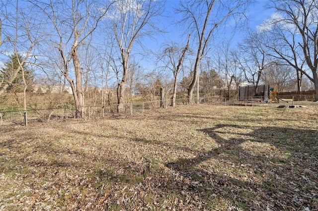 view of yard with a trampoline