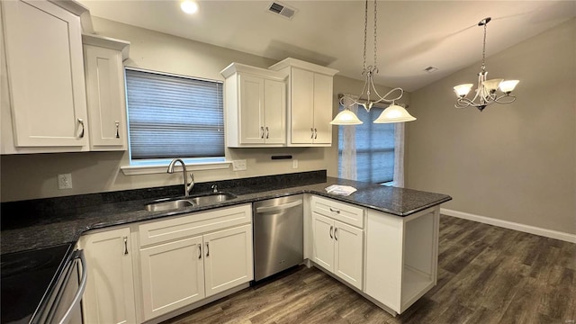 kitchen with sink, white cabinetry, stainless steel appliances, decorative light fixtures, and kitchen peninsula