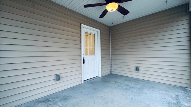 exterior space featuring ceiling fan