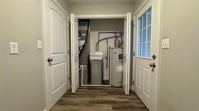 entryway featuring electric water heater and dark hardwood / wood-style floors