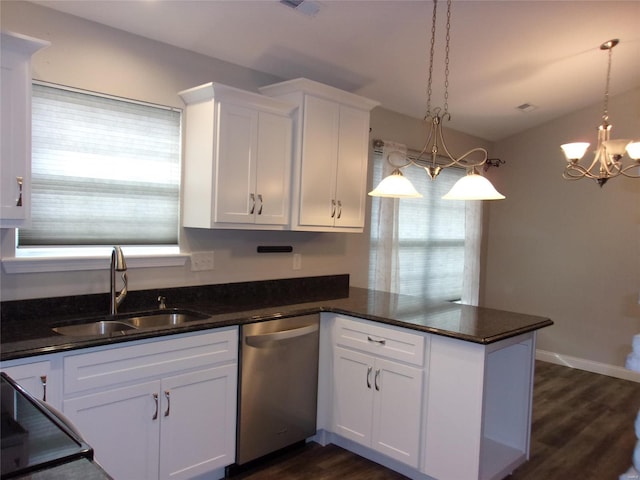 kitchen with white cabinetry, sink, stainless steel dishwasher, and hanging light fixtures