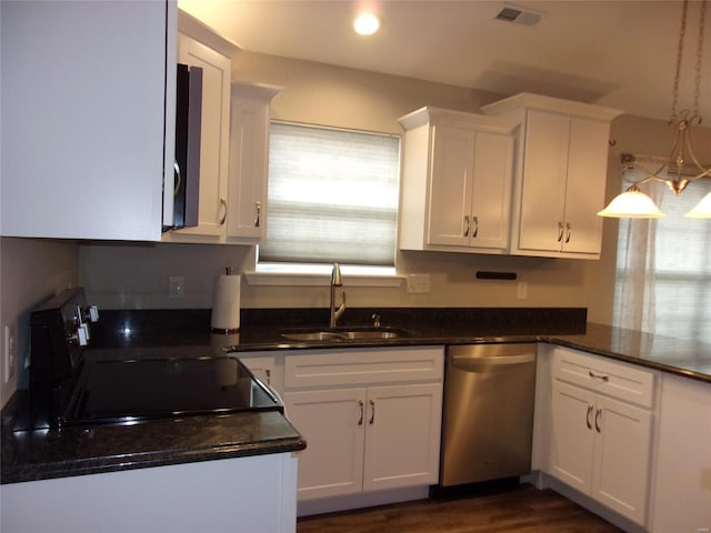 kitchen featuring pendant lighting, sink, dishwasher, white cabinetry, and range with electric cooktop