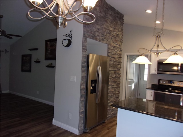 kitchen with ceiling fan, appliances with stainless steel finishes, dark hardwood / wood-style floors, white cabinets, and decorative light fixtures