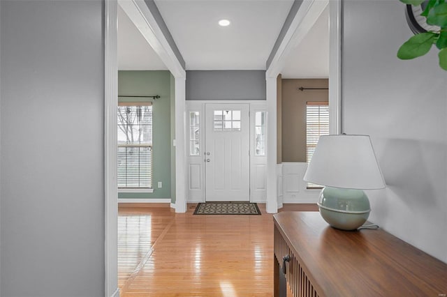 entryway with light hardwood / wood-style flooring and a wealth of natural light