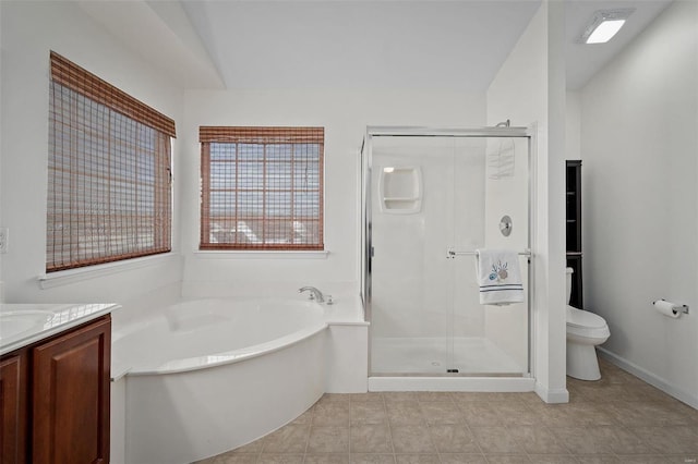 full bathroom featuring vanity, lofted ceiling, toilet, and plus walk in shower