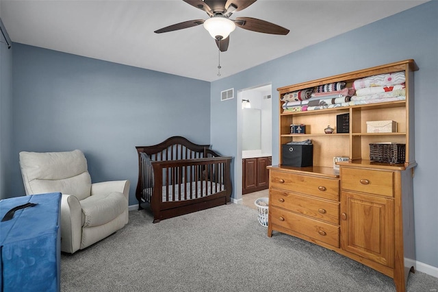 bedroom featuring light carpet and ceiling fan