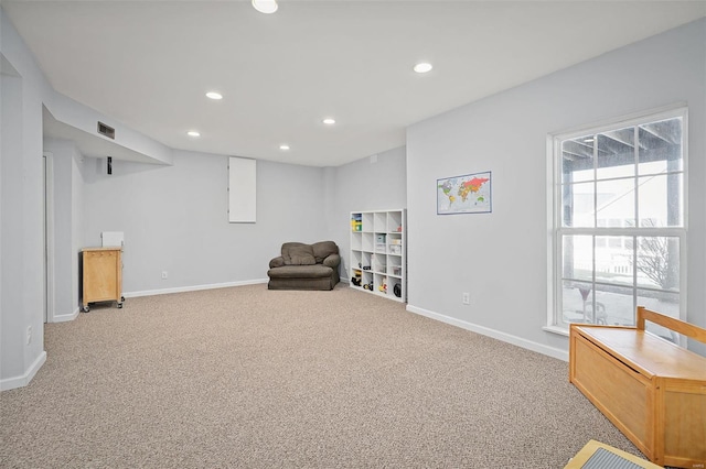 sitting room with carpet flooring