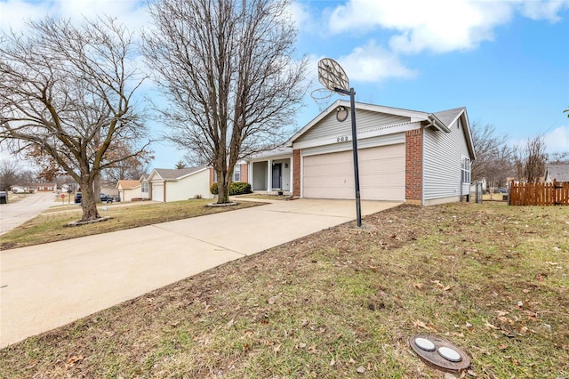 single story home with a garage and a front yard