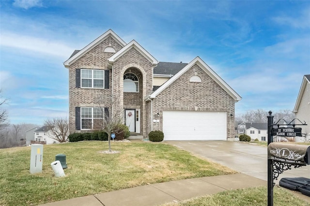 view of property with a garage and a front yard