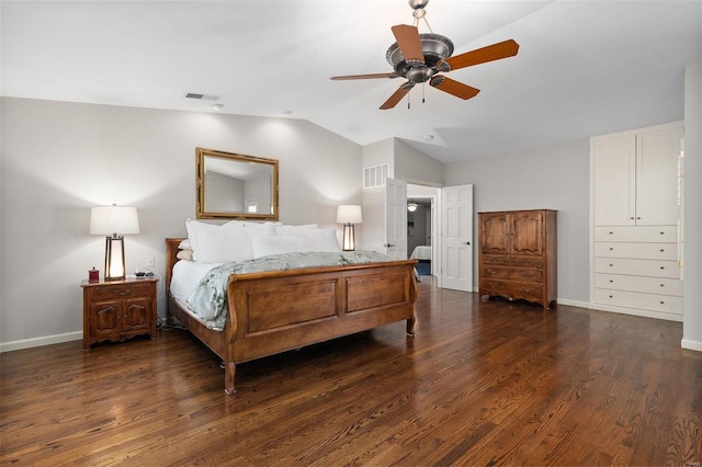 bedroom featuring vaulted ceiling, dark hardwood / wood-style floors, and ceiling fan