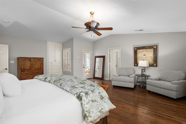 bedroom with lofted ceiling, dark wood-type flooring, and ceiling fan