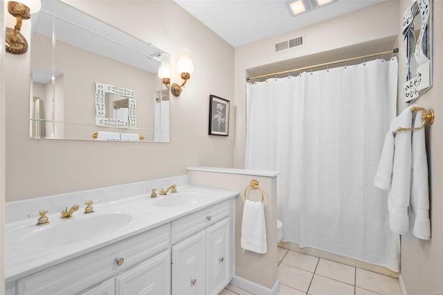 bathroom featuring vanity, tile patterned floors, and a shower with shower curtain