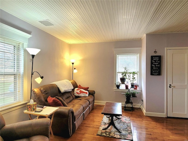 living room with hardwood / wood-style floors and a wealth of natural light