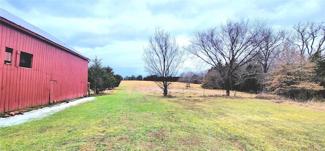 view of yard with a rural view