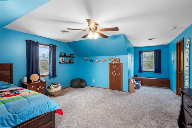 bedroom featuring carpet, lofted ceiling, and ceiling fan