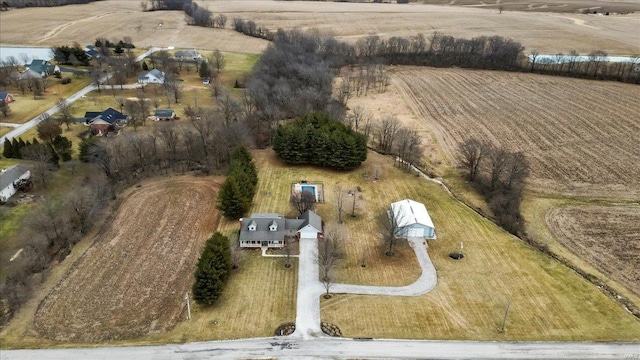 birds eye view of property with a rural view