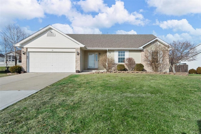 ranch-style home with a garage and a front lawn