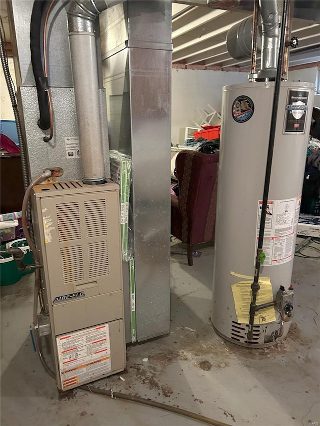 utilities featuring heating unit and gas water heater