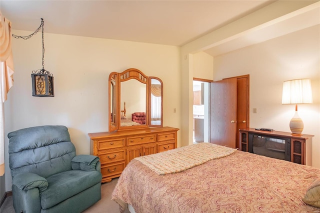 bedroom featuring beam ceiling