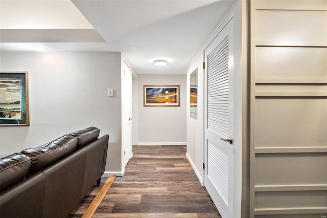 hall with dark wood-type flooring