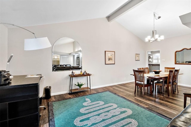 dining area featuring hardwood / wood-style flooring, an inviting chandelier, and vaulted ceiling with beams