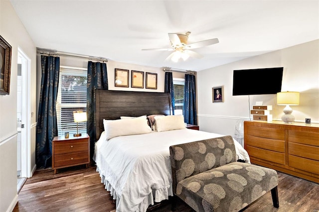 bedroom featuring dark wood-type flooring and ceiling fan