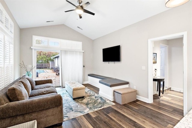 living room featuring lofted ceiling, hardwood / wood-style floors, and ceiling fan