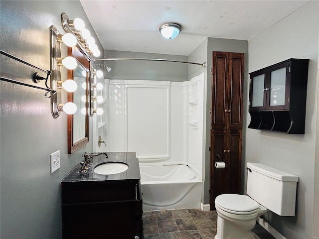 full bathroom featuring vanity, tub / shower combination, and toilet