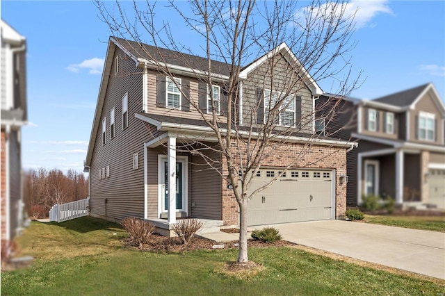 view of front of house with a garage and a front yard