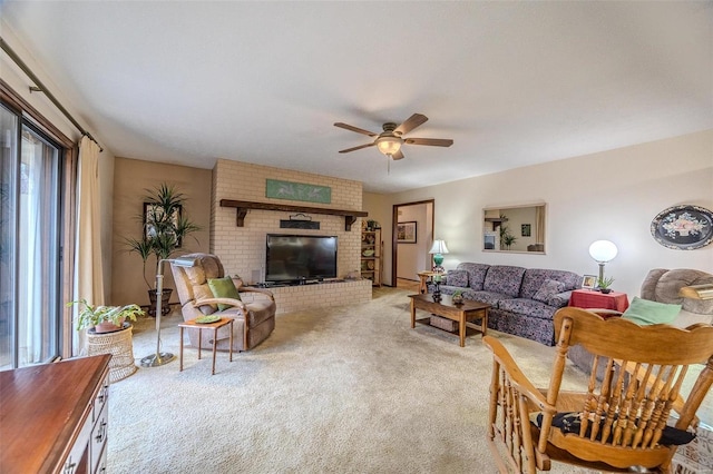 living room with ceiling fan, light colored carpet, and a brick fireplace