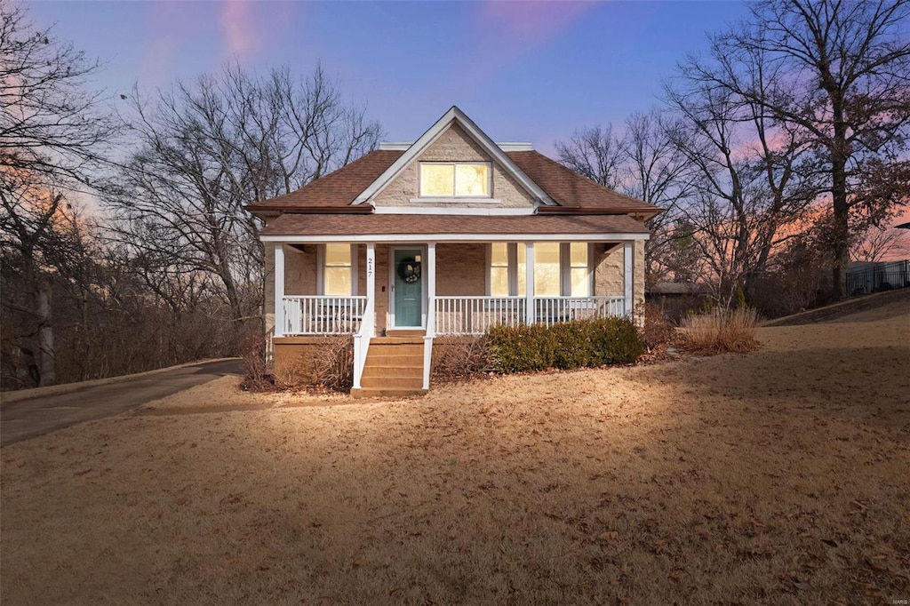 view of front of home with covered porch