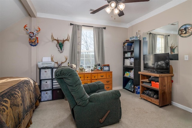 bedroom with ceiling fan, multiple windows, and carpet