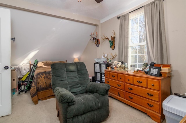 sitting room featuring ceiling fan and light colored carpet