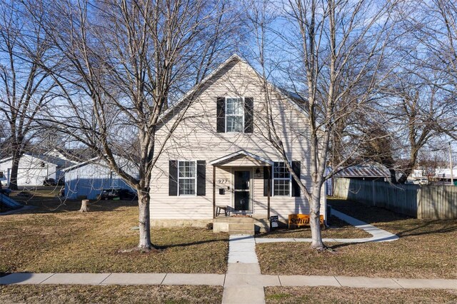 front facade with a front lawn