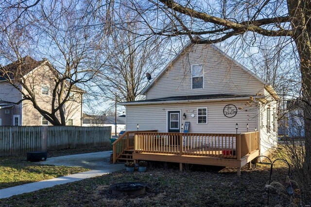 rear view of property with a deck