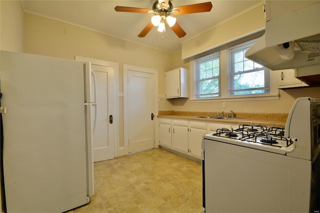 kitchen featuring crown molding, white appliances, and white cabinets