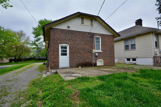 back of house with a patio area