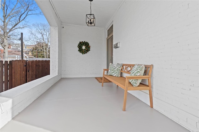 view of patio / terrace featuring fence