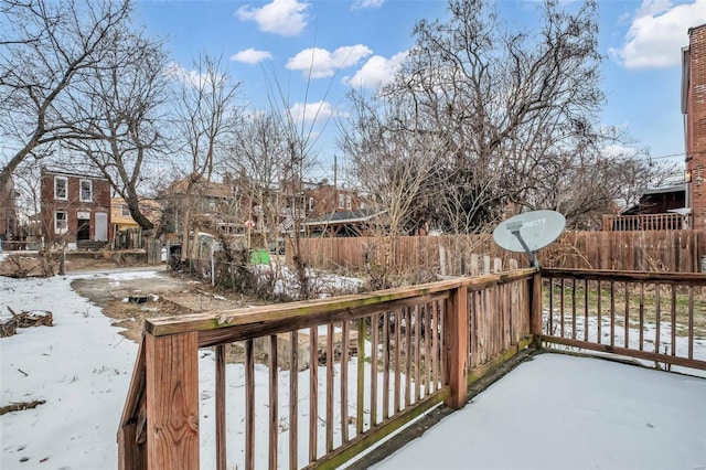 view of snow covered deck